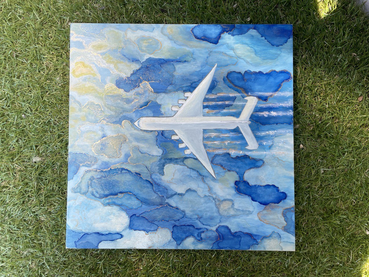 The “Mriya” plane, 2023. Ink art picture on wood. 14 x 14 inches; 35 x 35 cm.